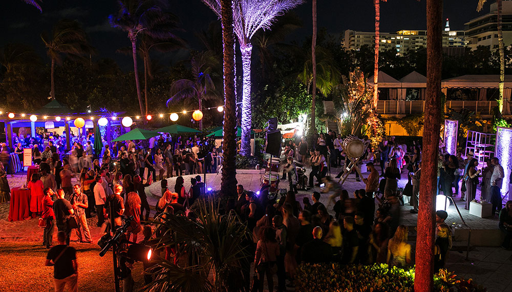 live band playing at nighttime outside event at Kimpton Surfcomber Hotel