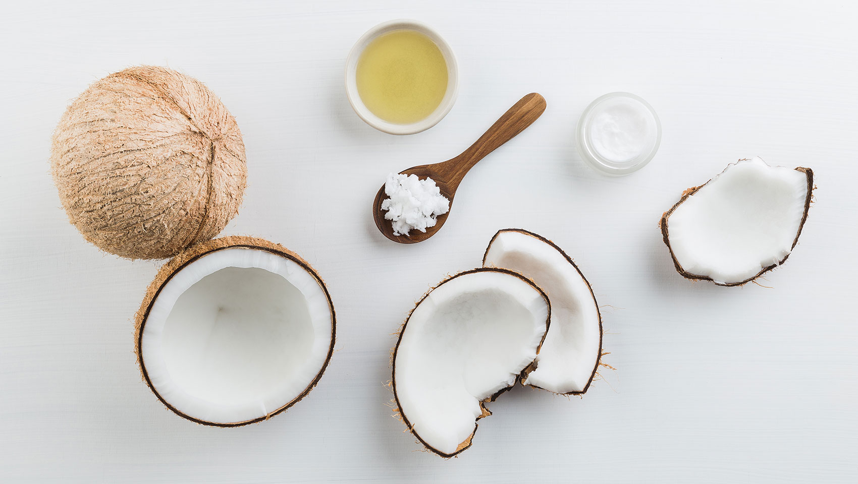 Overhead photo of coconuts on a white table