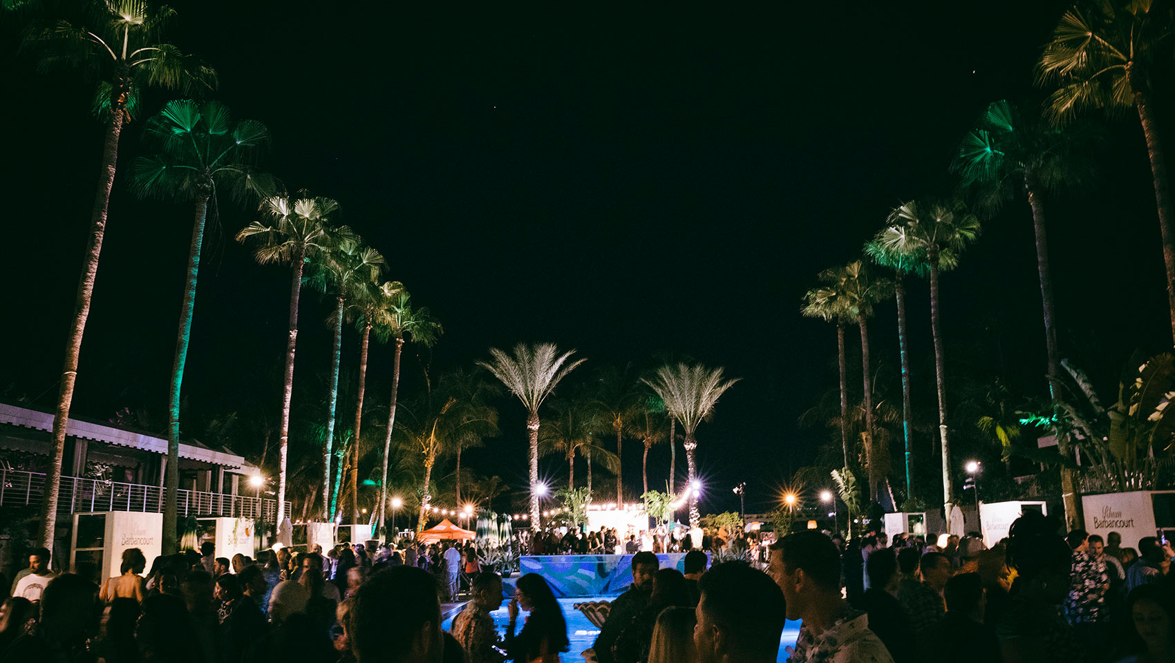 Nighttime shot of food & wine event at Kimpton Surfcomber Hotel