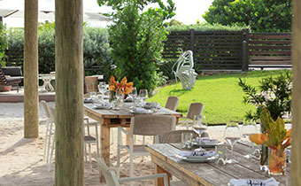 Outdoor seating at High Tide Beach Bar & Grill